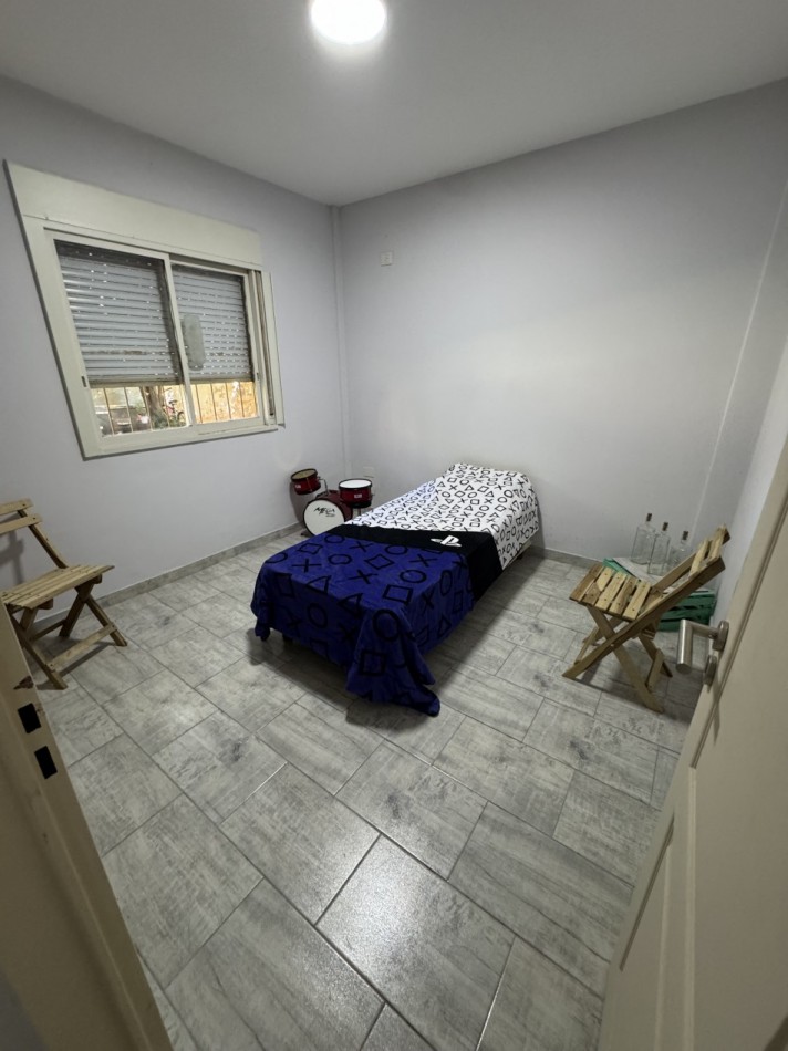 DEPARTAMENTO 4 AMBIENTES CON COCHERA EN PLANTA BAJA.