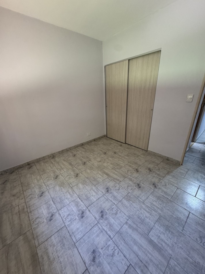 DEPARTAMENTO 4 AMBIENTES CON COCHERA EN PLANTA BAJA.