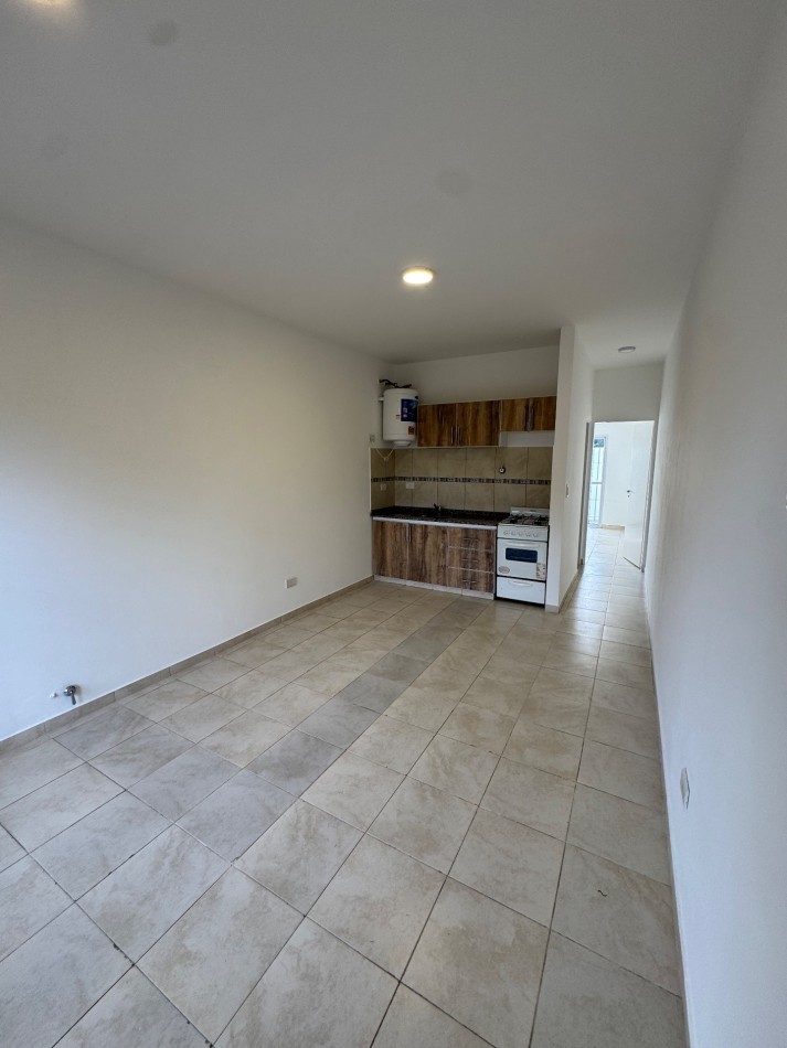 DEPARTAMENTO 2 AMBIENTES CON PATIO Y COCHERA EN VENTA